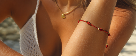 Pulseira sete nós dourada