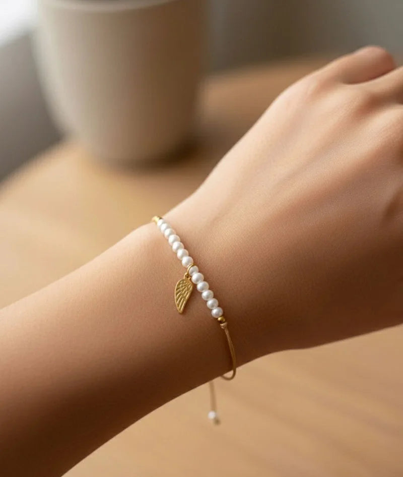Pulseira de Pérolas e Asa - IrinasB | vista 2